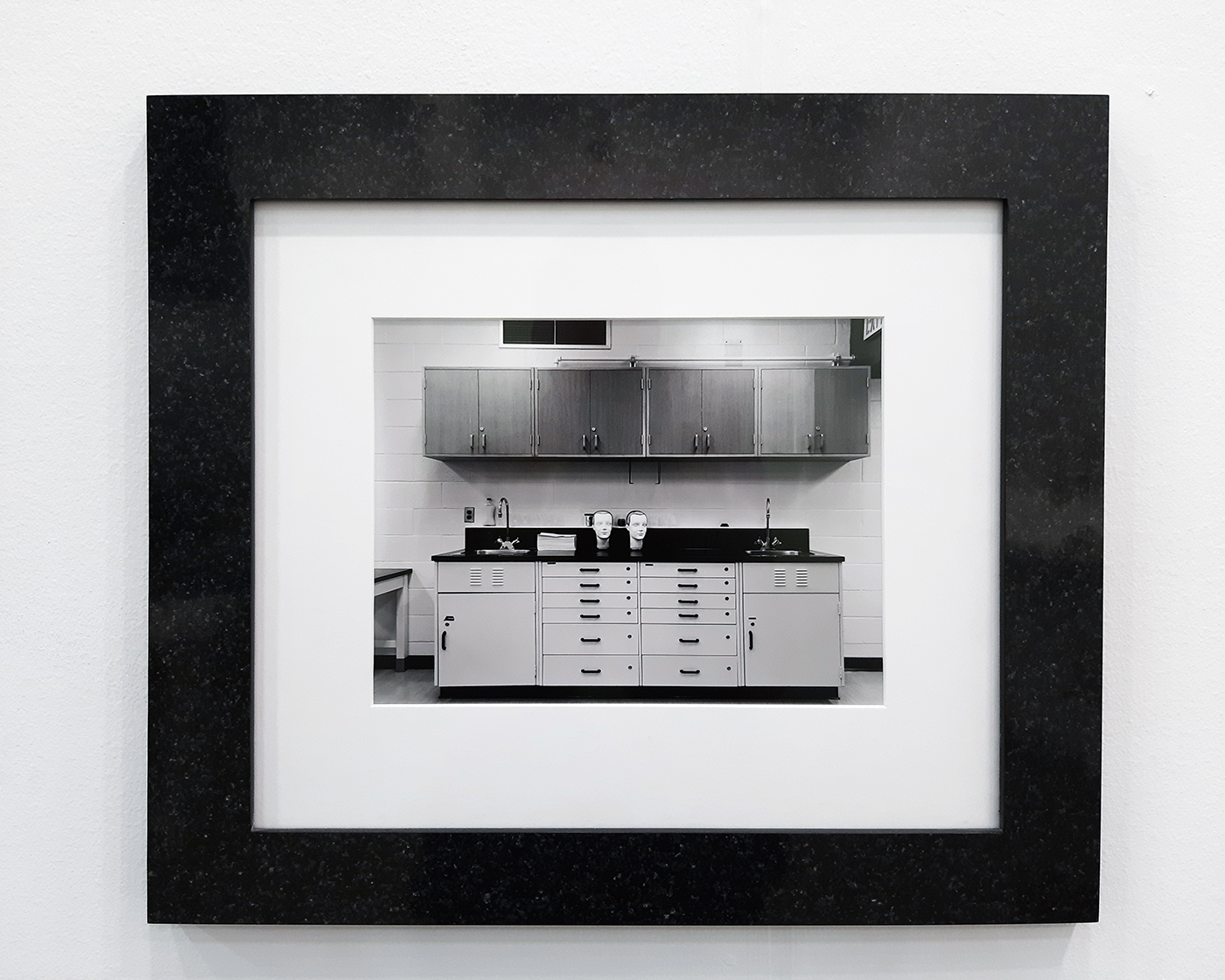 Lynne Cohen / Estate  - Untitled (Heads on Cabinet), 1990's (2012)